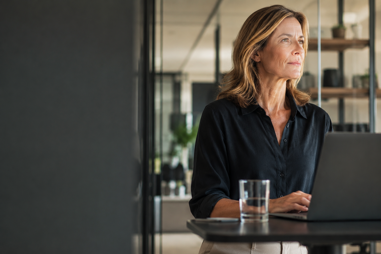A focused adult in a cool modern setting, sharp and present